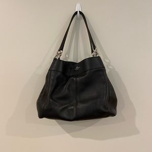 Coach Lexi shoulder bag. Color is Black with silver hardware. Smoke free home.